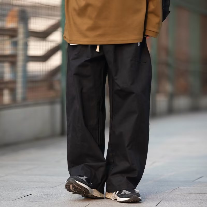 Pantalon de sport ample et basique pour homme, couleur unie, tendance, idéal pour l'été et le sport